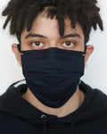 Luis wearing All Navy Mask